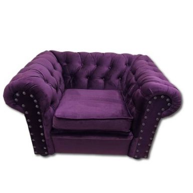 Sofá tipo Chester en terciopelo.